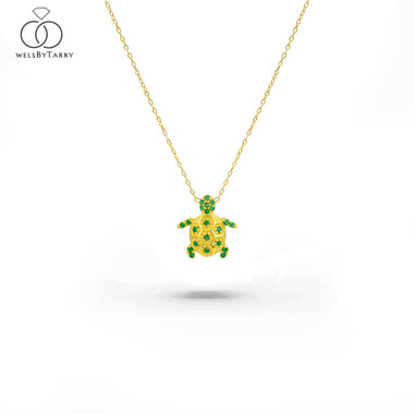 yellow_gold_stone_emerald_turtle_charm_necklace_jewels_by_tarry