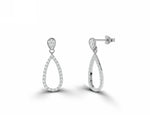 white_gold_diamond_teardrop_stud_earrings_jewels_by_tarry