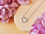 white_gold_diamond_heart_shaped_necklace_jewels_by_tarry