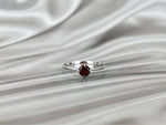 white_gold_round_gemstone_garnet_ring_jewels_by_tarry