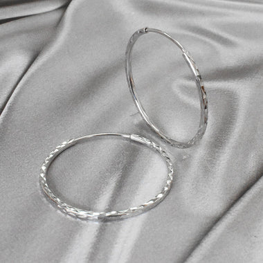 white_gold_diamond_thin_hoop_earrings_jewels_by_tarry