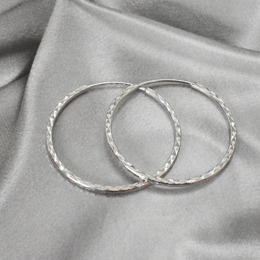 white_gold_diamond_thin_hoop_earrings_jewels_by_tarry