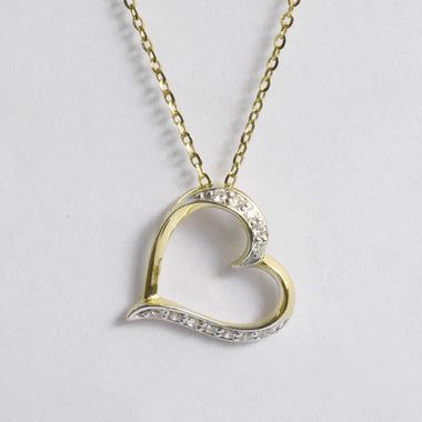 yellow_gold_diamond_heart_necklace_jewels_by_tarry