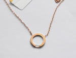 Gold Circle Pendant Necklace With Baguette Diamond