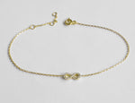 Infinity Charm Diamond Bracelet in Solid Gold