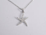white_gold_diamond_starfish_necklace_jewels_by_tarry
