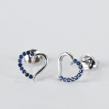 white_gold_stone_blue_sapphire_heart_shaped_stud_earrings_jewels_by_tarry