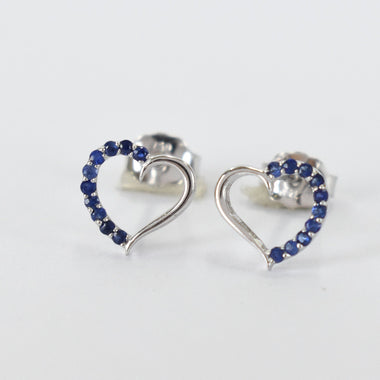 white_gold_stone_blue_sapphire_heart_shaped_stud_earrings_jewels_by_tarry