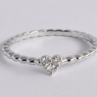 white_gold_diamond_tiny_heart_ring_jewels_by_tarry