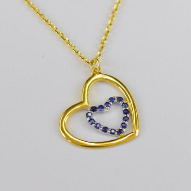 yellow_gold_stone_blue_sapphire_heart_necklace_jewels_by_tarry