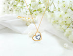 Blue Sapphire Heart Shaped Necklace in Two Tone Gold