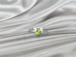 white_gold_round_solitaire_gemstone_peridot_ring_jewels_by_tarry