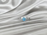 white_gold_round_cut_solitaire_gemstone_london_blue_topaz_ring_jewels_by_tarry