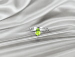 white_gold_pear_cut_gemstone_peridot_ring_jewels_by_tarry