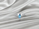 white_gold_pear_cut_gemstone_london_blue_topaz_ring_jewels_by_tarry