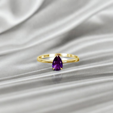 yellow_gold_pear_cut_gemstone_amethyst_ring_jewels_by_tarry