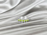 white_gold_multiple_gemstone_peridot_half_eternity_ring_jewels_by_tarry