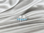 white_gold_multiple_gemstone_london_blue_topaz_half_eternity_ring_jewels_by_tarry