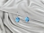 white_gold_gemstone_london_blue_topaz_oval_shaped_dangle_earrings_jewels_by_tarry