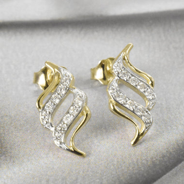 yellow_gold_diamond_spiral_stud_earrings_jewels_by_tarry